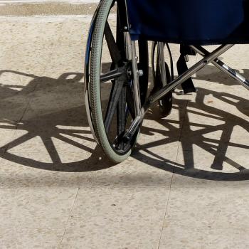 a wheelchair and its shadow