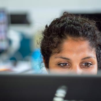 Women in front on computer.